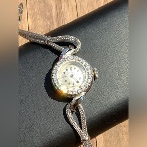 - SOLID WHITE GOLD LECOULTRE Diamond bezel,